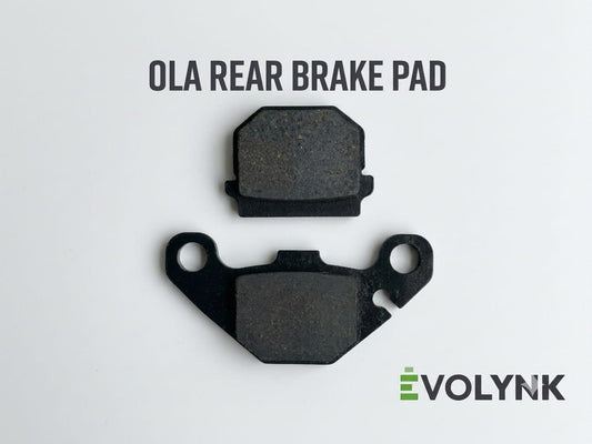 Evolynk Ola rear brake pad set, friction surfaces visible